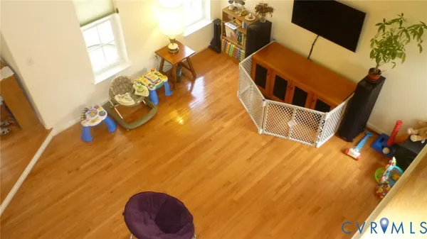 a view of workspace with wooden floor