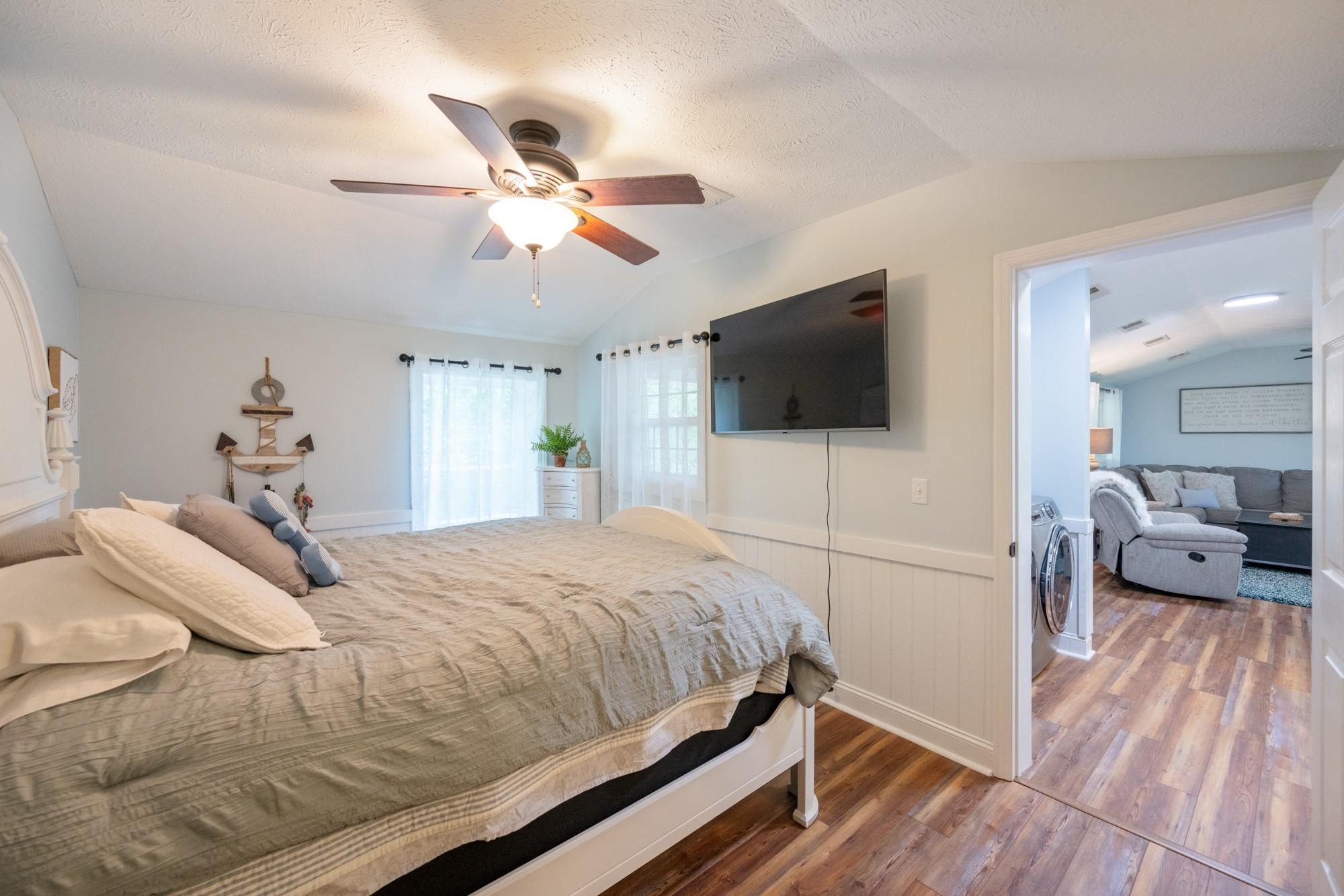 91 Creekside View Lane Decaturville, TN 38329 - Photo 12 of 57 a bedroom with a bed and a flat screen tv