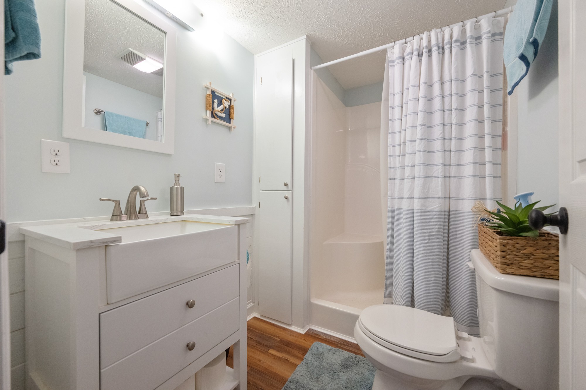 91 Creekside View Lane Decaturville, TN 38329 - Photo 13 of 57 a bathroom with a sink toilet and shower