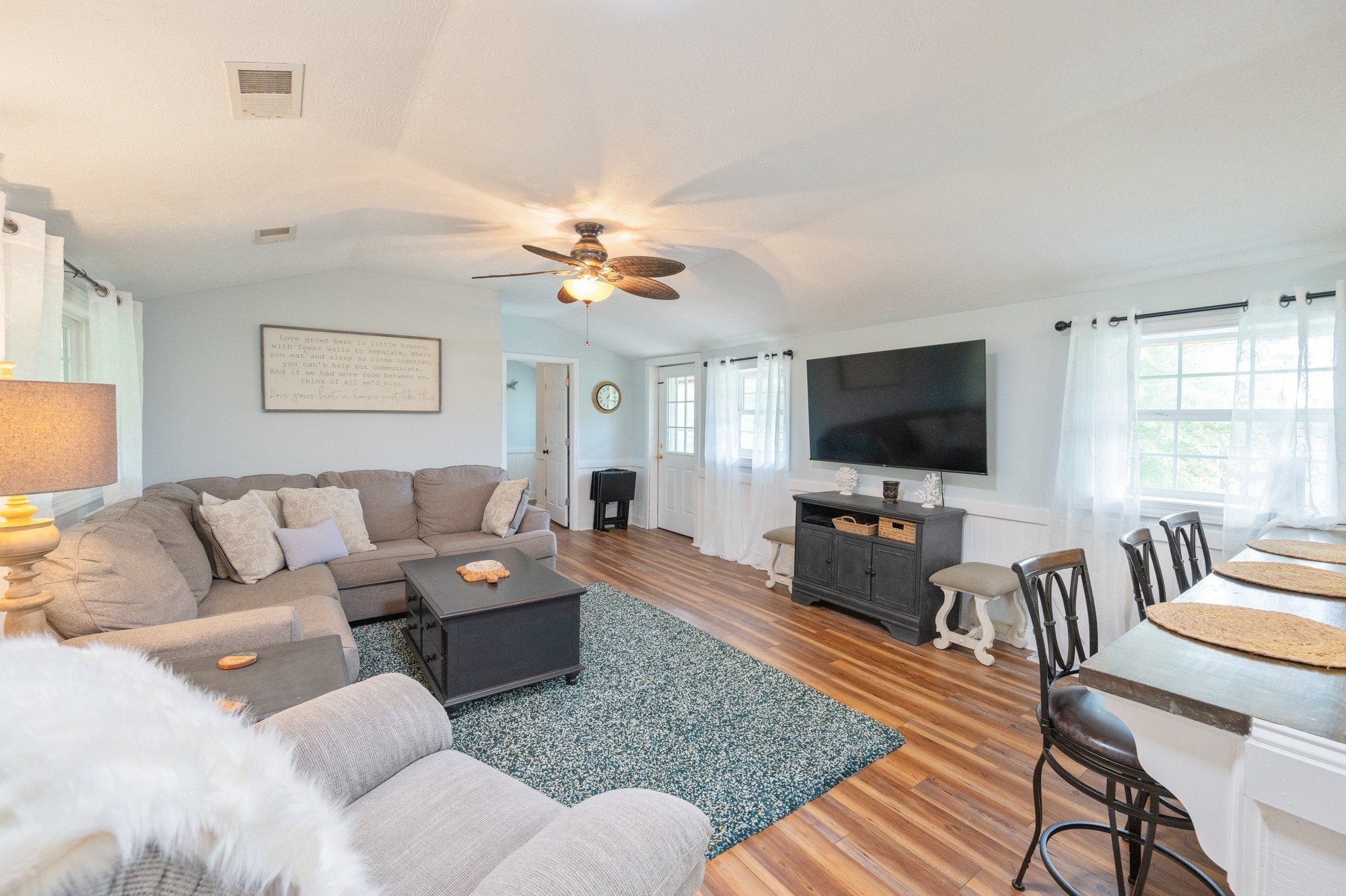 91 Creekside View Lane Decaturville, TN 38329 - Photo 14 of 57 a living room with furniture and a flat screen tv