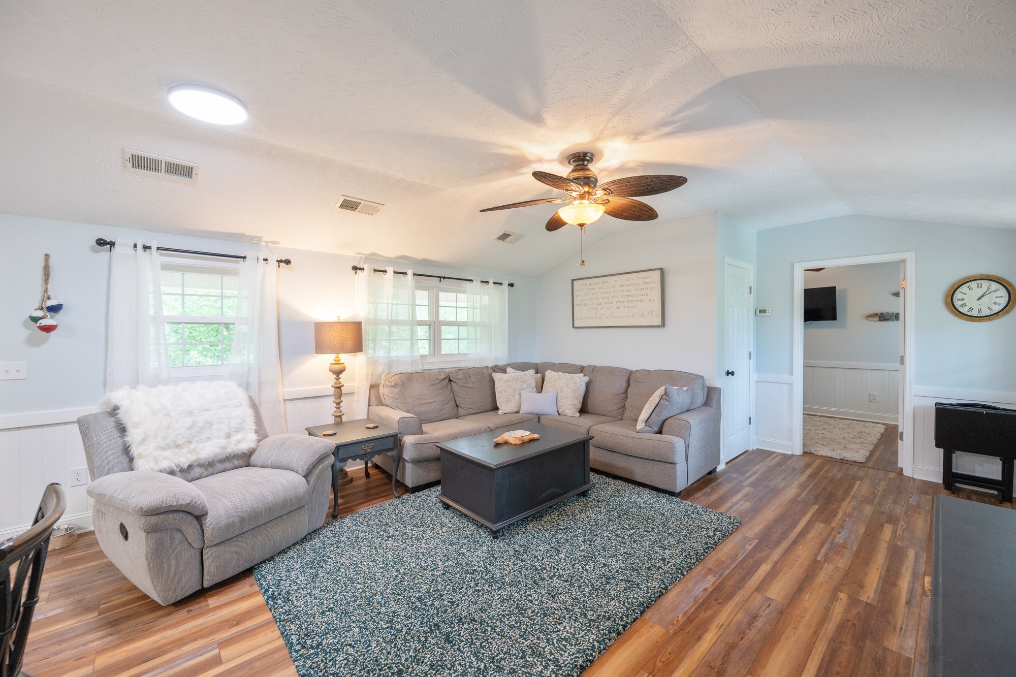 91 Creekside View Lane Decaturville, TN 38329 - Photo 15 of 57 a living room with furniture and a wooden floor