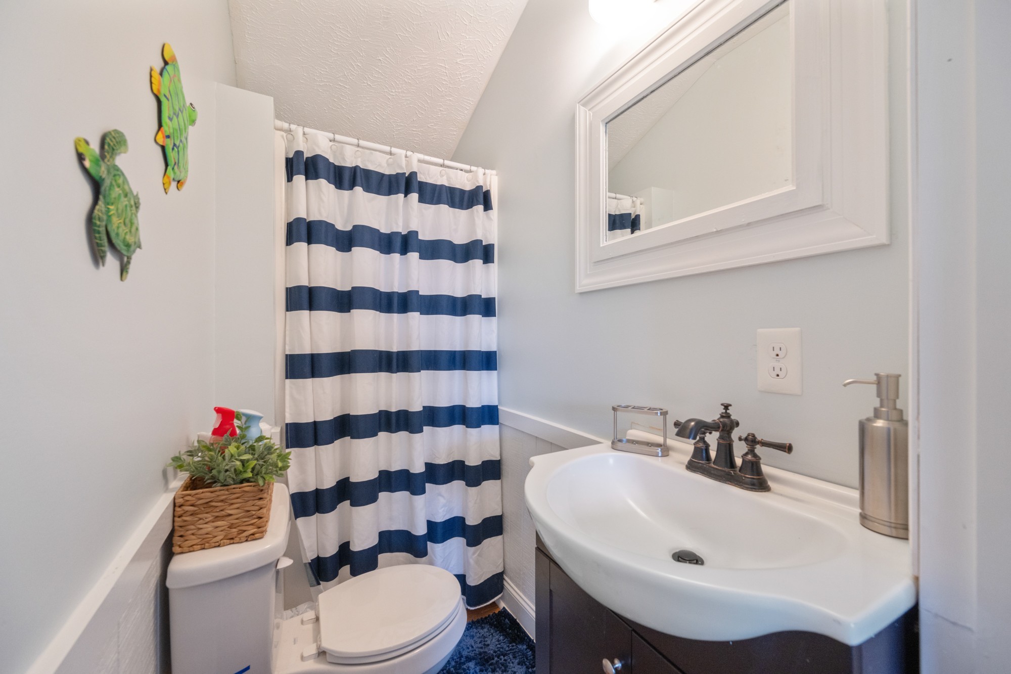 91 Creekside View Lane Decaturville, TN 38329 - Photo 19 of 57 a bathroom with a sink toilet and shower