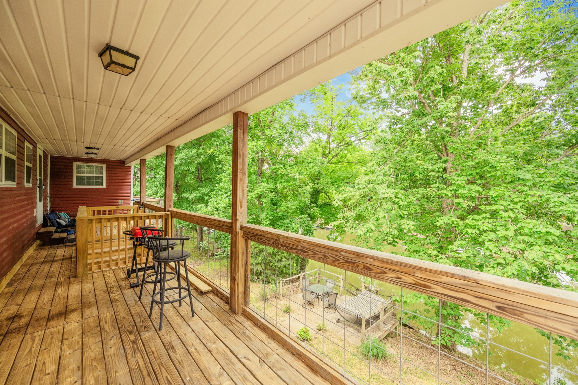 91 Creekside View Lane Decaturville, TN 38329 - Photo 2 of 57 a view of balcony with chairs