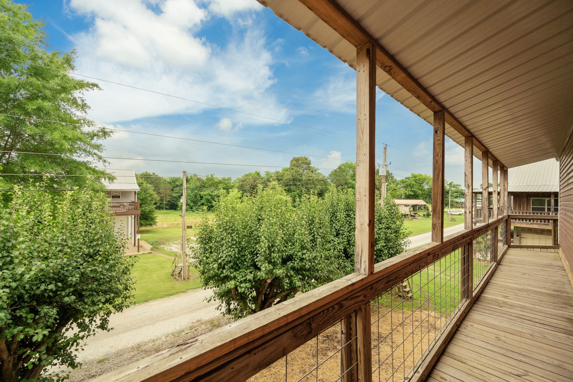 91 Creekside View Lane Decaturville, TN 38329 - Photo 22 of 57 a view of sky from a balcony