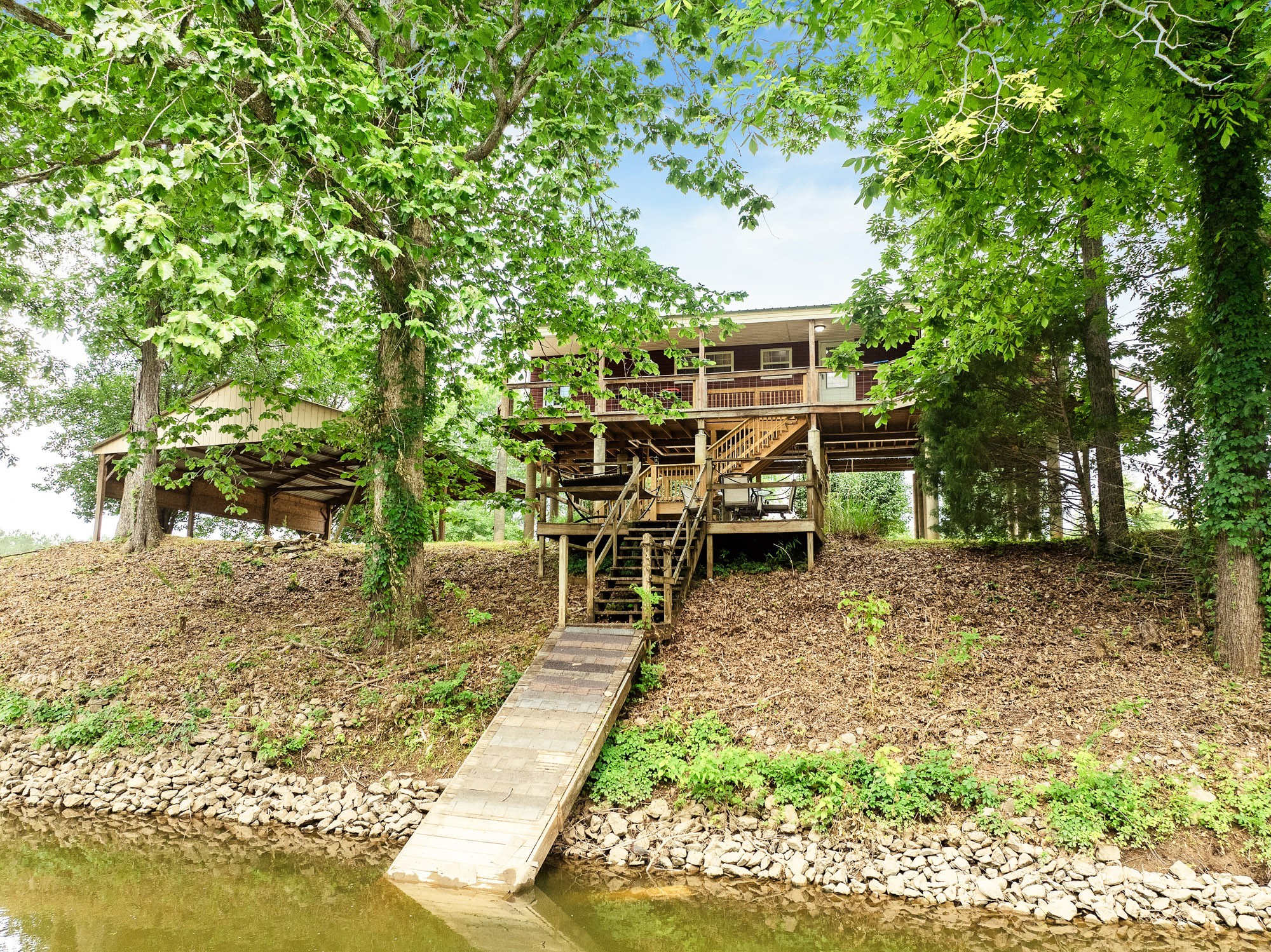91 Creekside View Lane Decaturville, TN 38329 - Photo 32 of 57 a view of a outdoor space with a patio