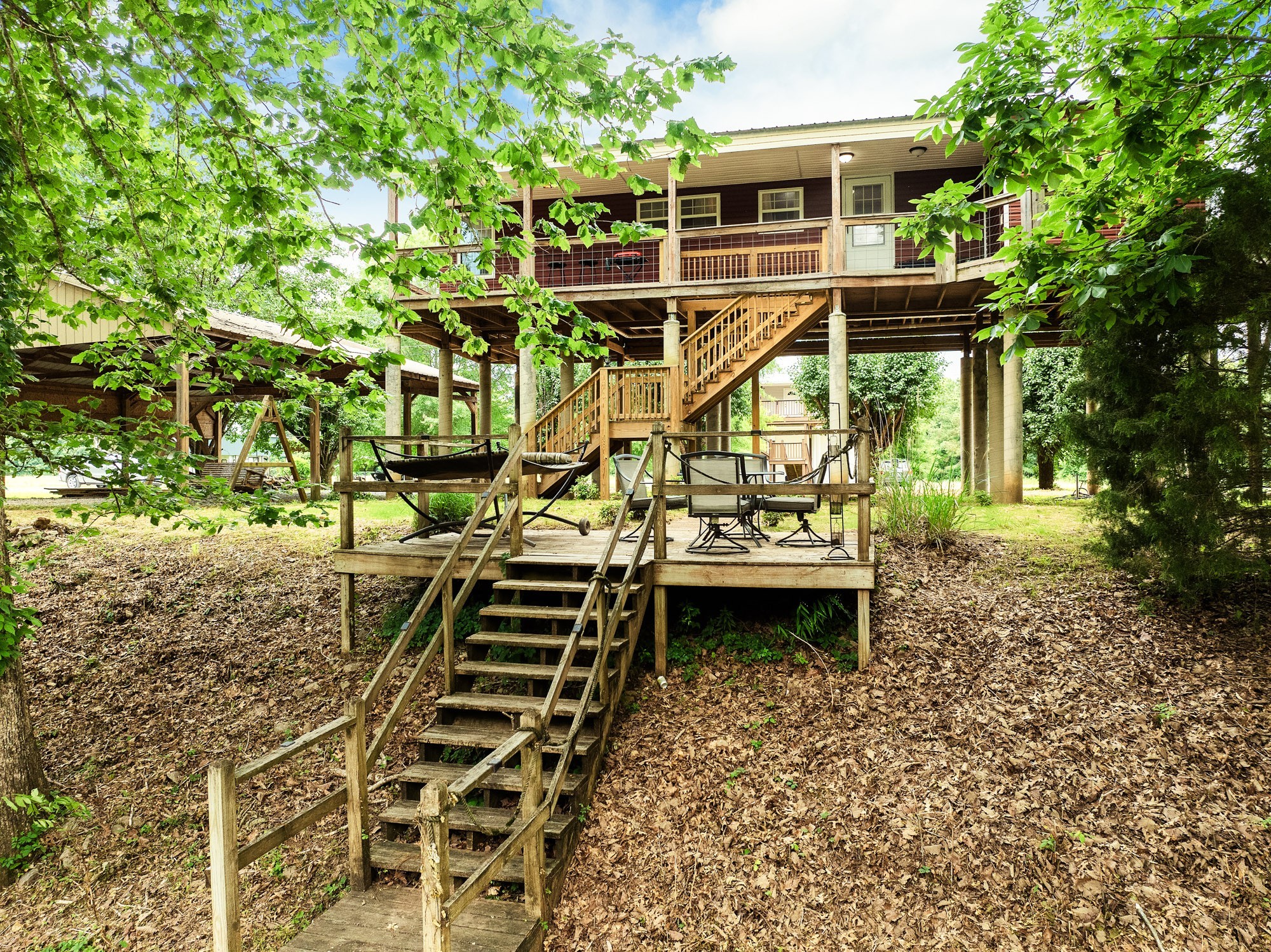 91 Creekside View Lane Decaturville, TN 38329 - Photo 33 of 57 a front view of a house with a yard
