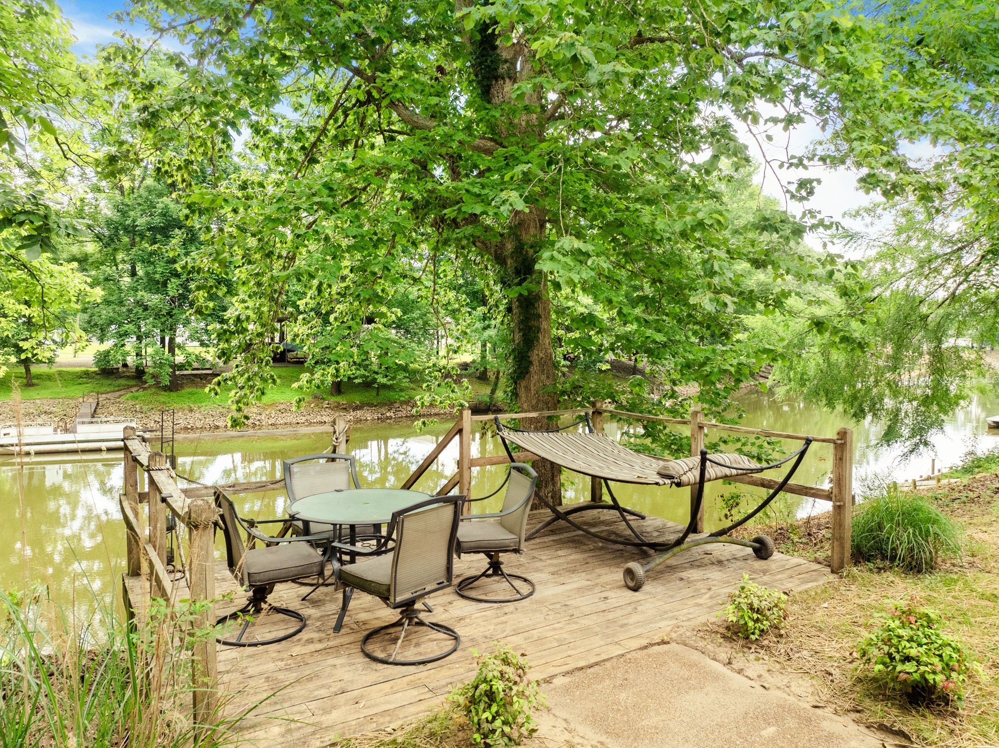 91 Creekside View Lane Decaturville, TN 38329 - Photo 34 of 57 a view of swimming pool with outdoor seating and plants