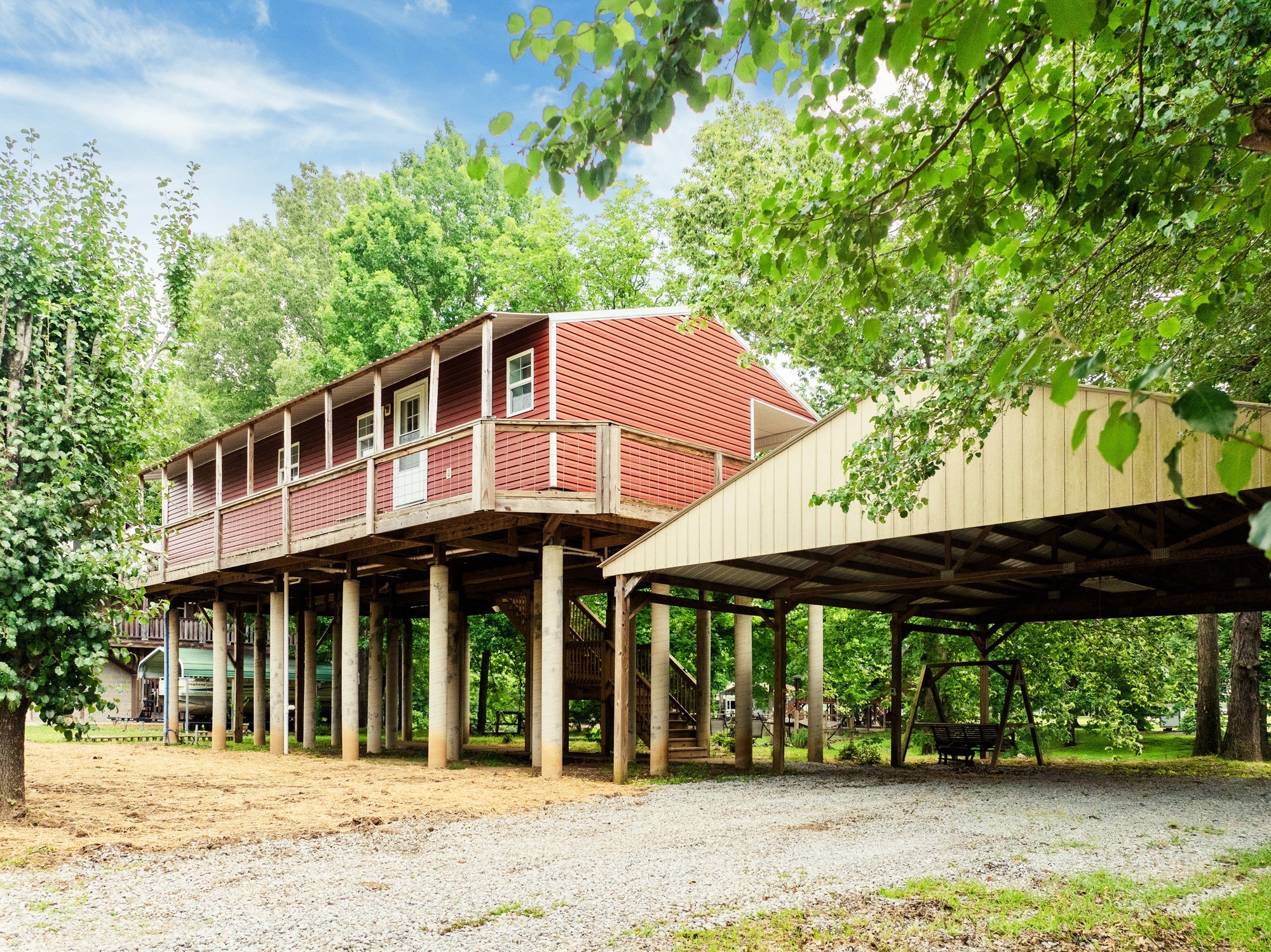 91 Creekside View Lane Decaturville, TN 38329 - Photo 37 of 57 a front view of a house with a garden