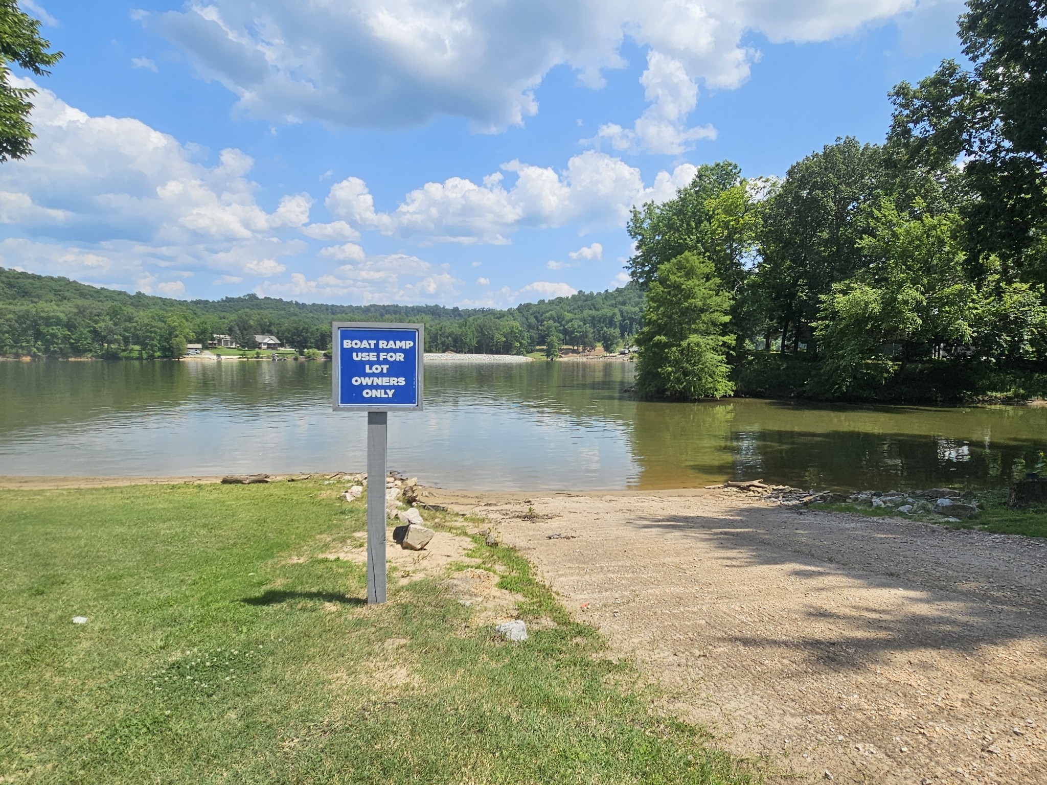91 Creekside View Lane Decaturville, TN 38329 - Photo 56 of 57 a view of a lake with a mountain in the background