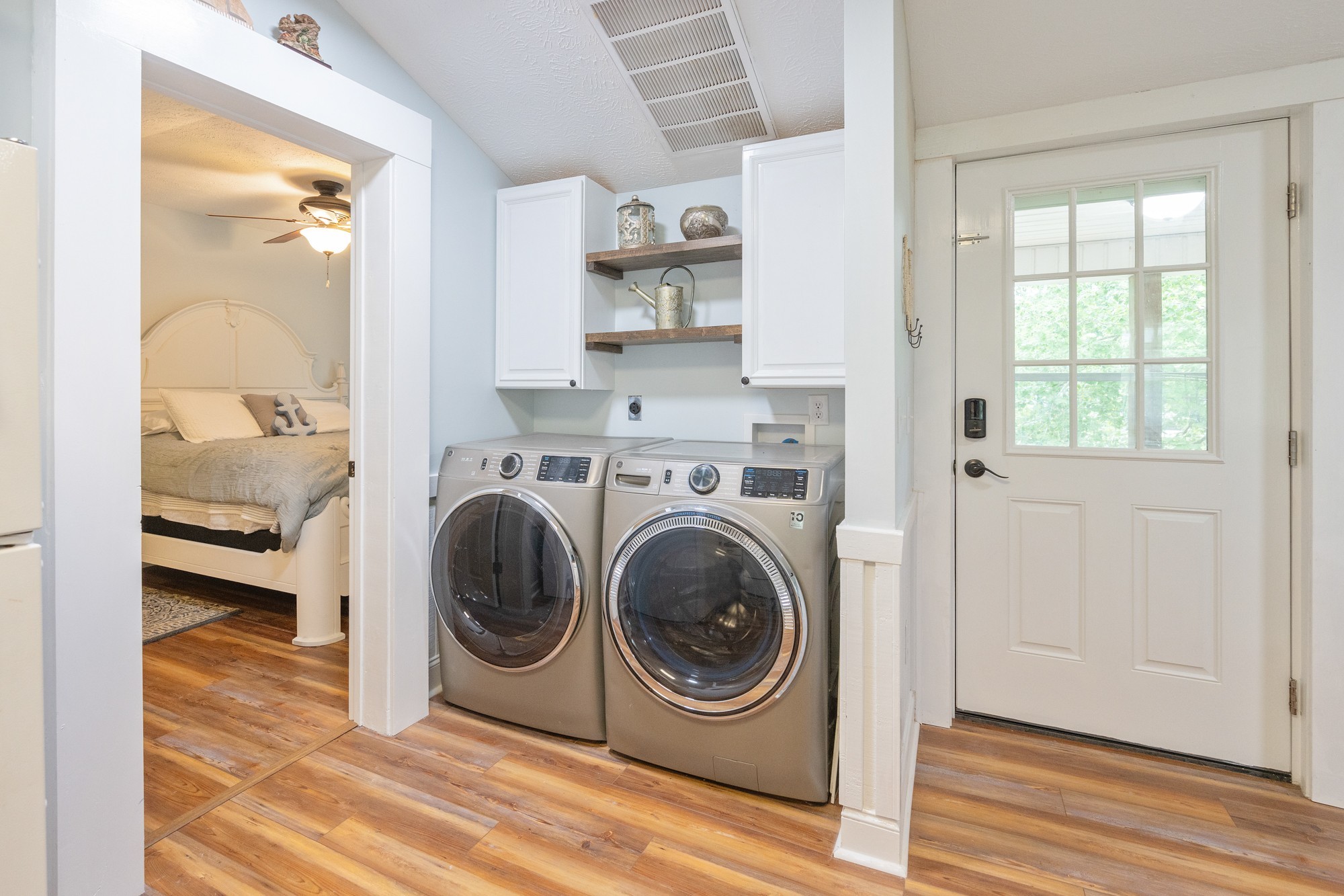 91 Creekside View Lane Decaturville, TN 38329 - Photo 10 of 57 a utility room with closet dryer and washer