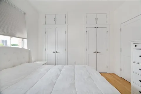 a view of a bedroom with closet