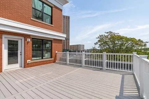 a view of a house with a deck