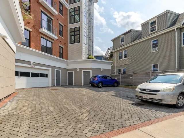 a car parked in front of a building