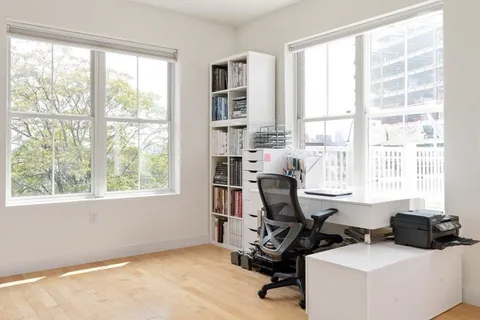 a view of a workspace with a window