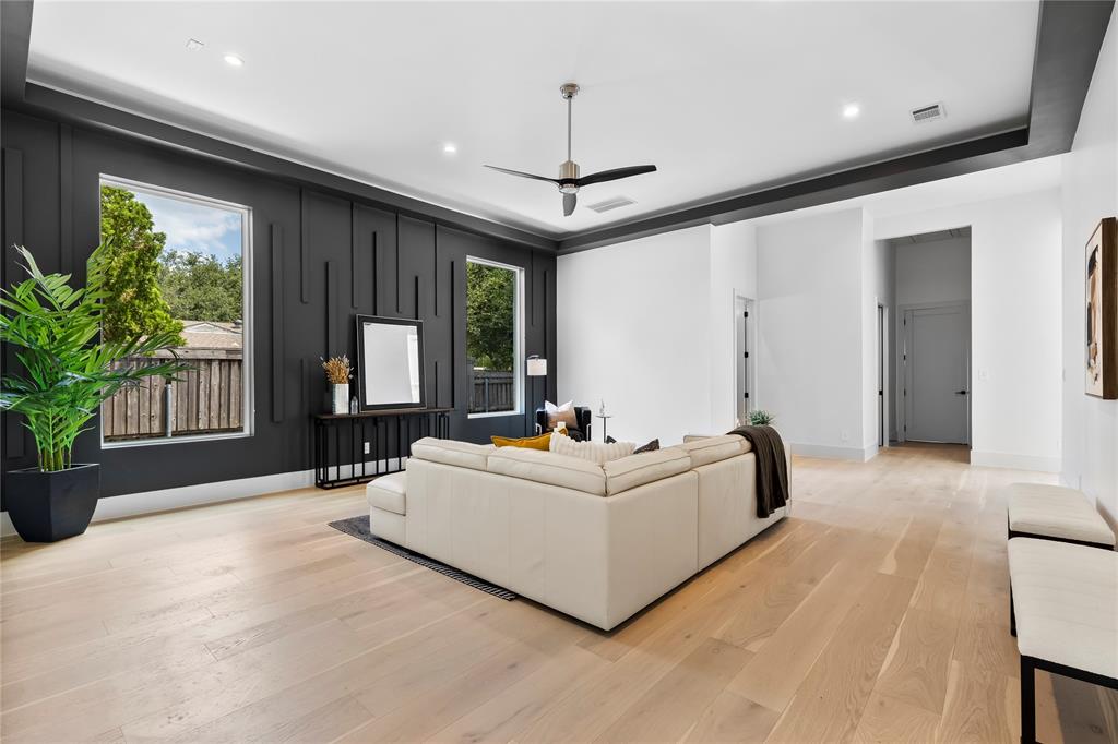11232 Hillcrest Road Dallas, TX 75230 - Photo 13 of 40 a living room with furniture and a large window