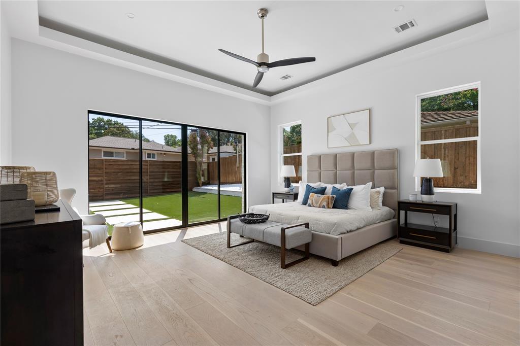 11232 Hillcrest Road Dallas, TX 75230 - Photo 19 of 40 a living room with furniture and large windows