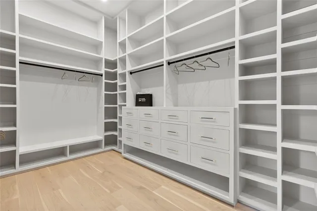 a view of an empty walk in closet