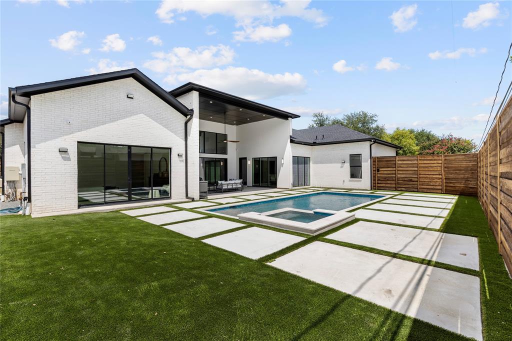 11232 Hillcrest Road Dallas, TX 75230 - Photo 36 of 40 a view of a house with backyard and porch