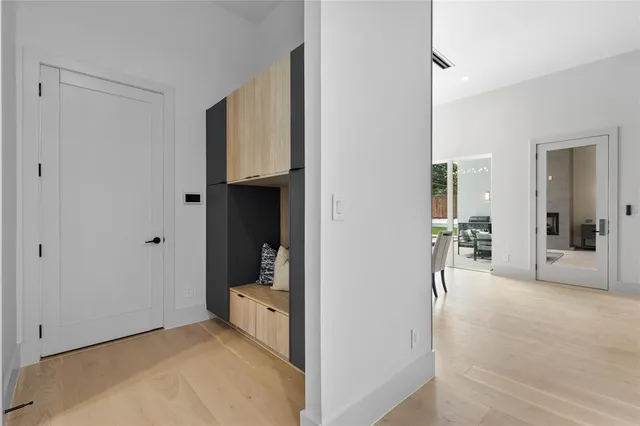 a view of a room with large windows and a bathroom