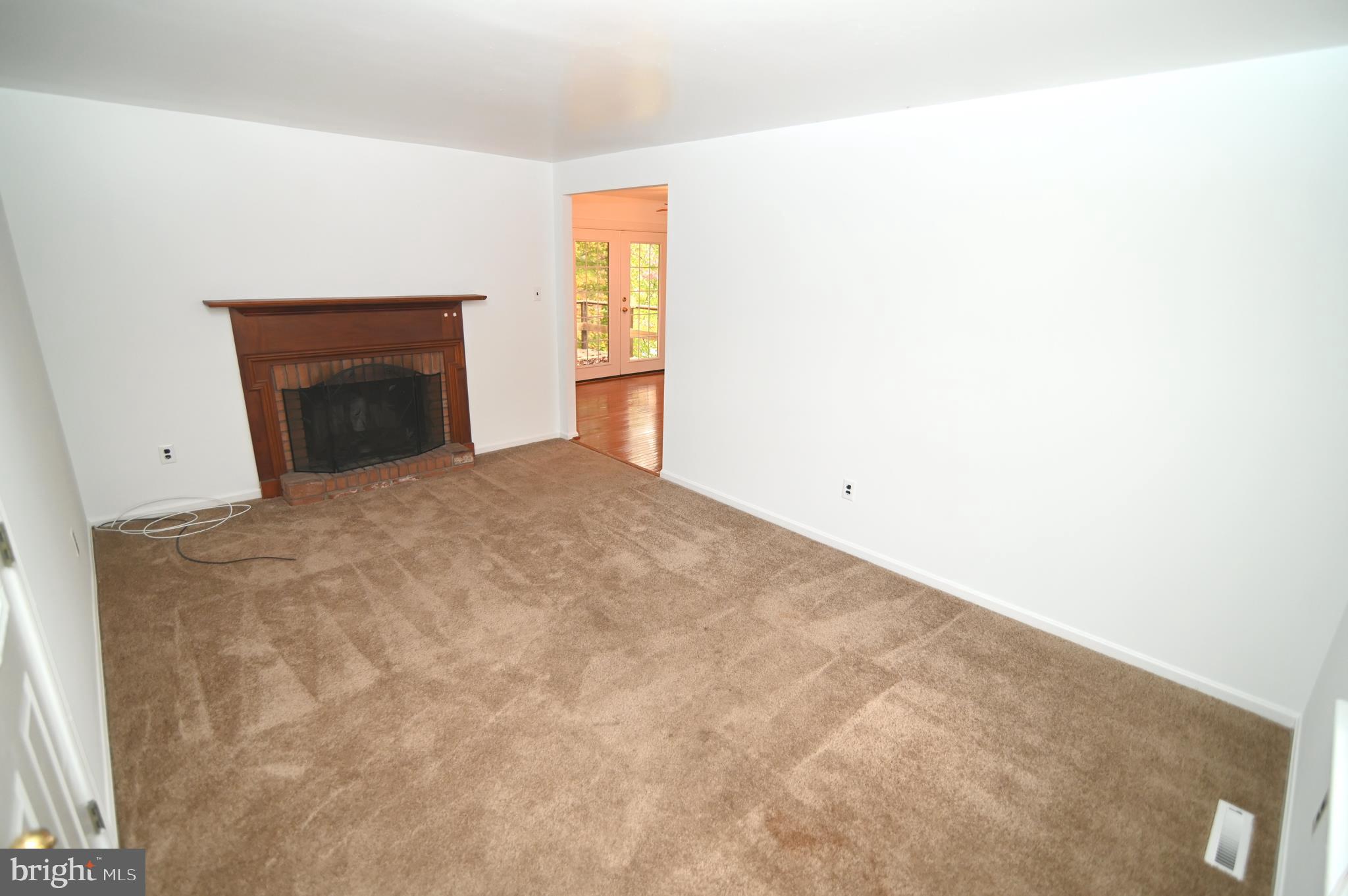 6760 Glen Albin Road La Plata, MD 20646 - Photo 4 of 25 Family room with fireplace