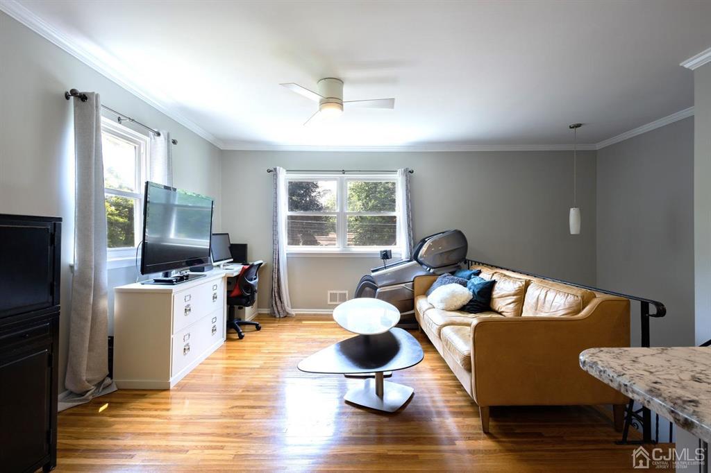 53 Edgemere Avenue Plainsboro, NJ 08536 - Photo 12 of 39 a living room with furniture and wooden floor