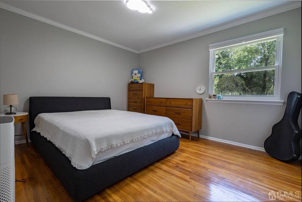 53 Edgemere Avenue Plainsboro, NJ 08536 - Photo 17 of 39 a bedroom with a bed and window