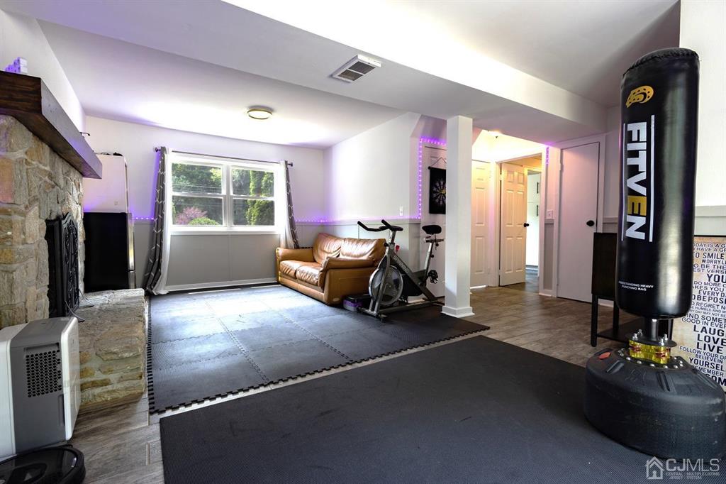 53 Edgemere Avenue Plainsboro, NJ 08536 - Photo 19 of 39 a view of a room with gym equipment