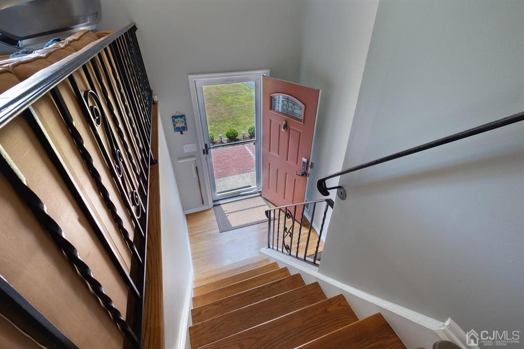 53 Edgemere Avenue Plainsboro, NJ 08536 - Photo 31 of 39 a view of entryway and hall with wooden floor
