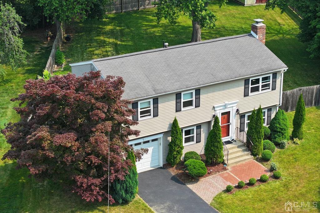 53 Edgemere Avenue Plainsboro, NJ 08536 - Photo 5 of 39 a aerial view of a house with a yard and potted plants