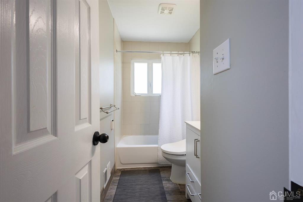 53 Edgemere Avenue Plainsboro, NJ 08536 - Photo 9 of 39 a bathroom with a sink toilet and shower