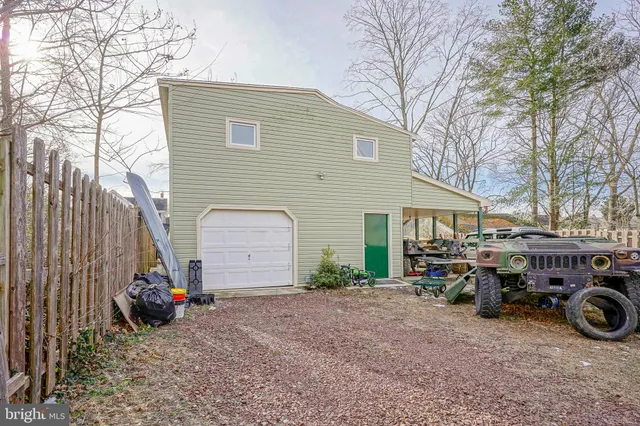 a view of a car in front of house