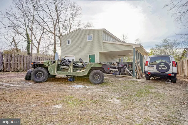a view of a garage with parked cars