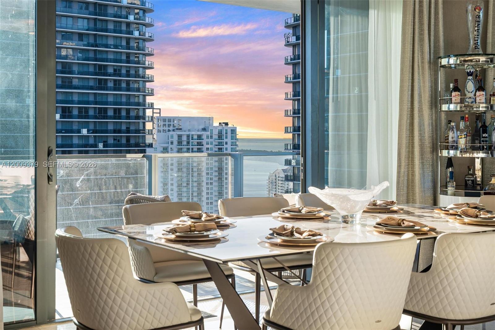 88 Southwest 7th Street, Unit 3801 Miami, FL 33130 - Photo 11 of 87 a view of a dining room with furniture and window