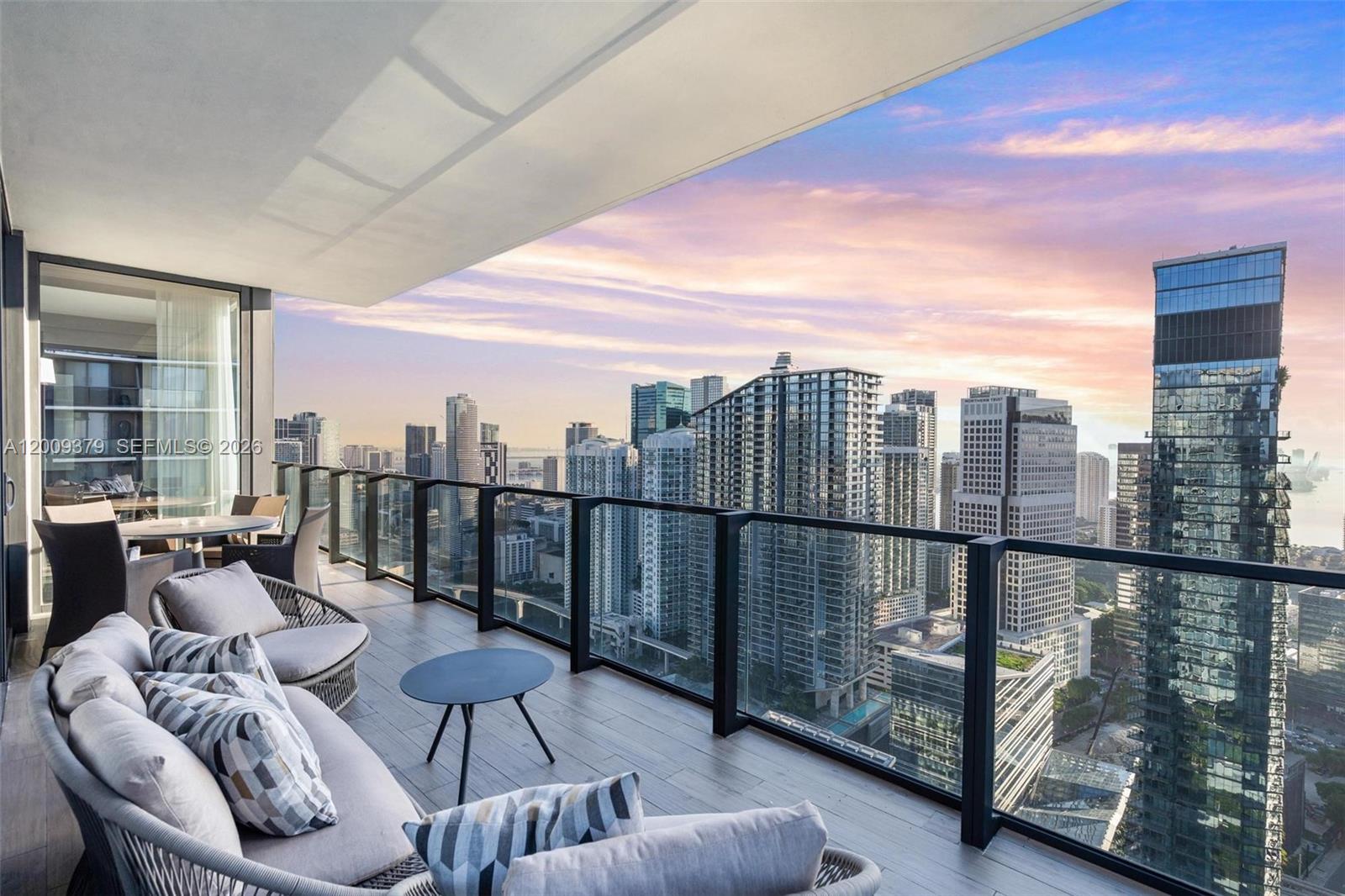 88 Southwest 7th Street, Unit 3801 Miami, FL 33130 - Photo 14 of 87 a balcony with furniture and city view