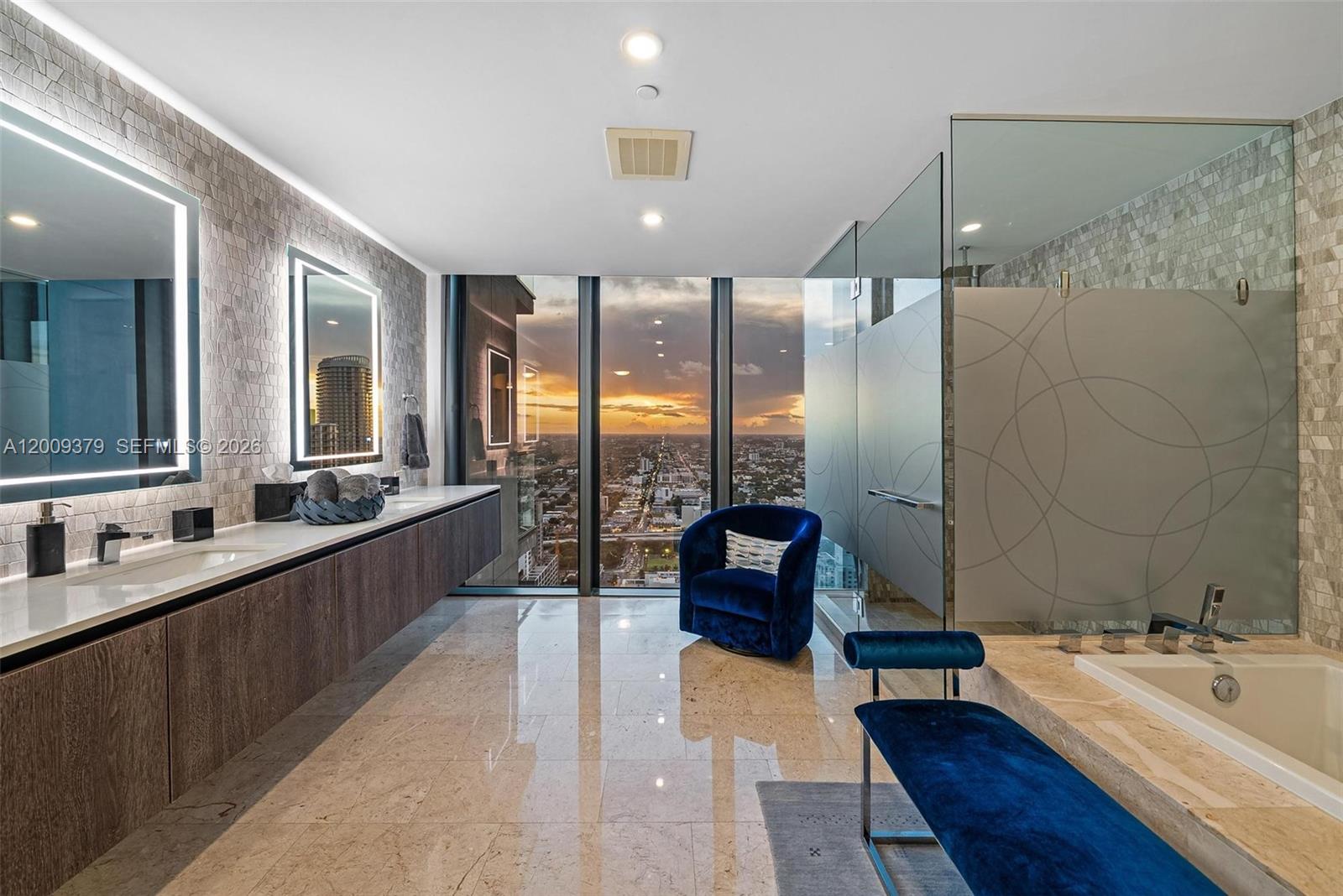 88 Southwest 7th Street, Unit 3801 Miami, FL 33130 - Photo 60 of 87 a large bathroom with a large tub and sink