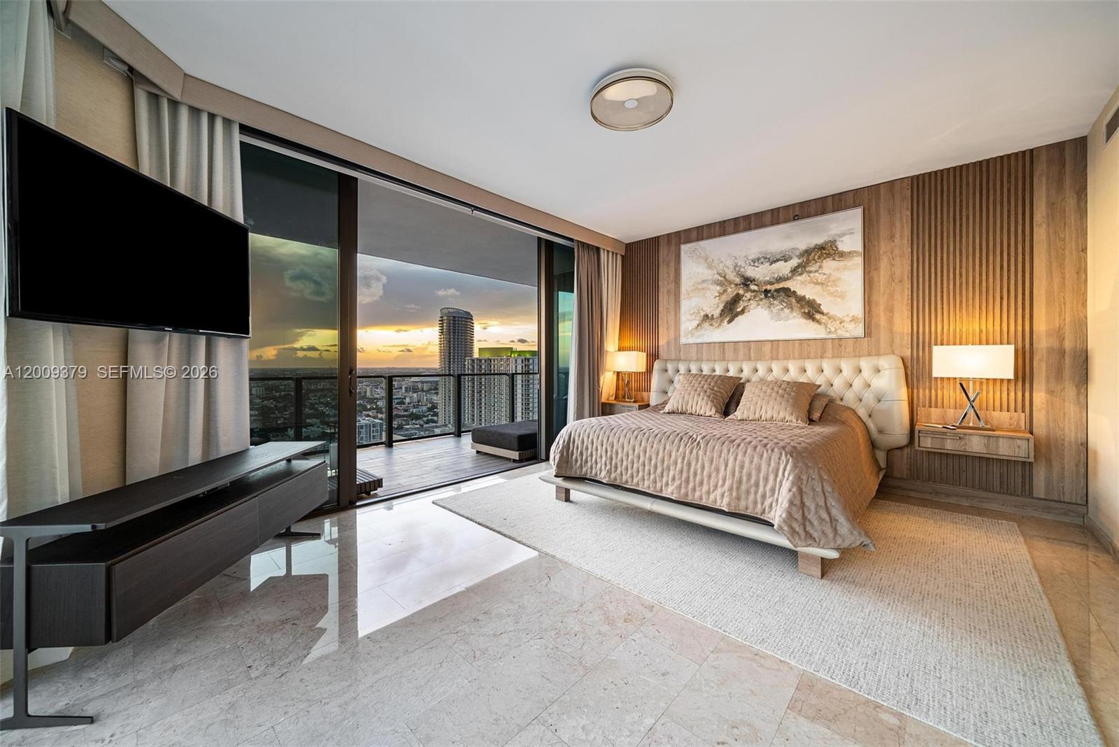 88 Southwest 7th Street, Unit 3801 Miami, FL 33130 - Photo 61 of 87 a bedroom with a bed and glass window