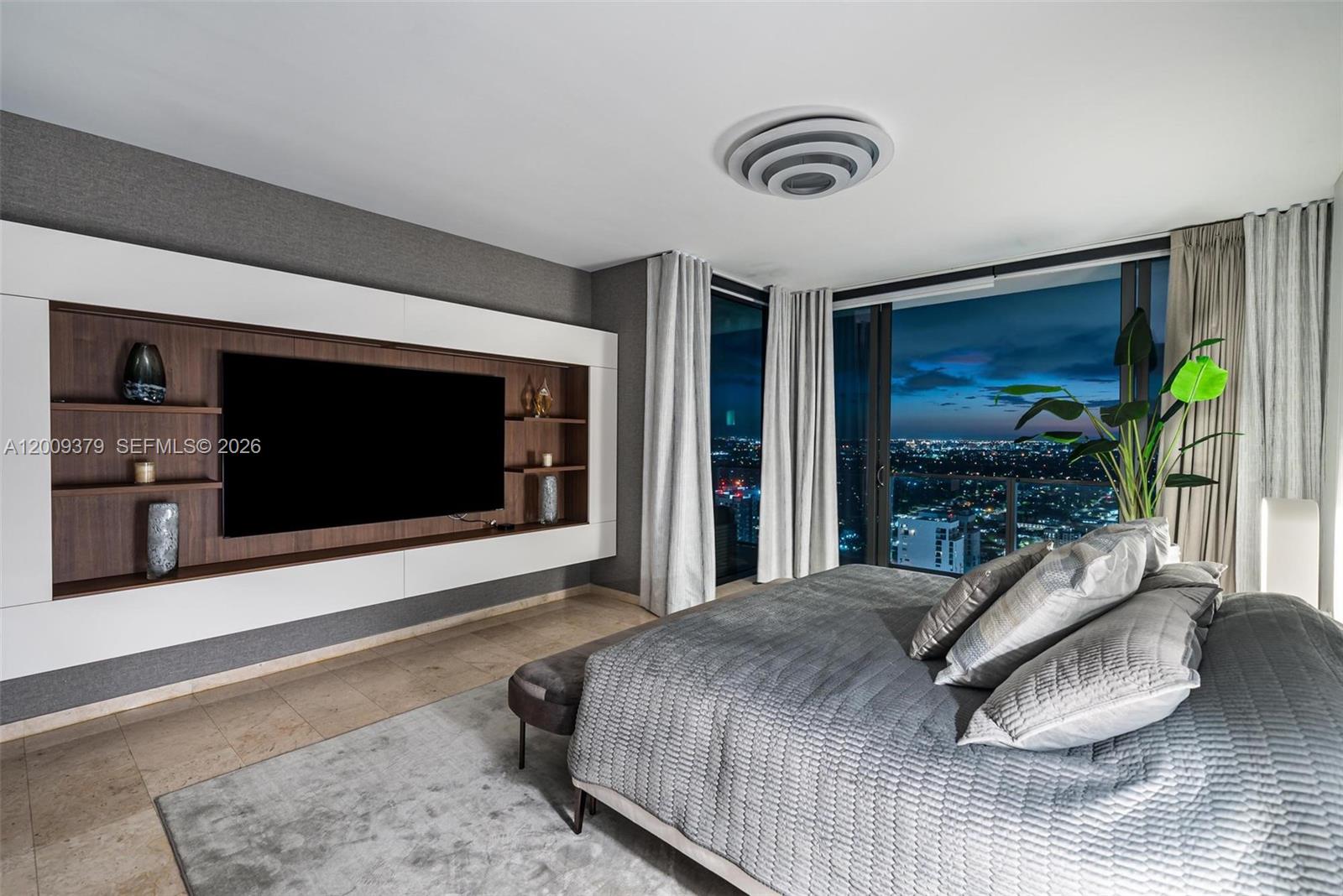 88 Southwest 7th Street, Unit 3801 Miami, FL 33130 - Photo 70 of 87 a bedroom with a bed and a flat screen tv