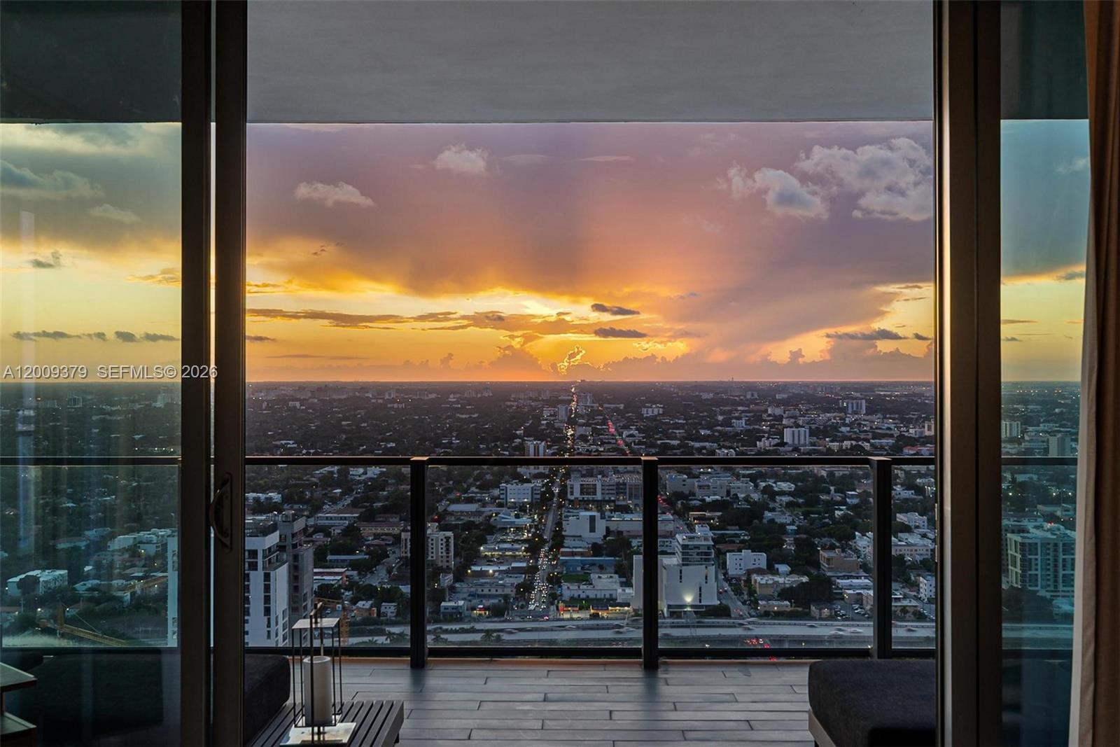 88 Southwest 7th Street, Unit 3801 Miami, FL 33130 - Photo 77 of 87 a view of a balcony with a lake view and a ocean view