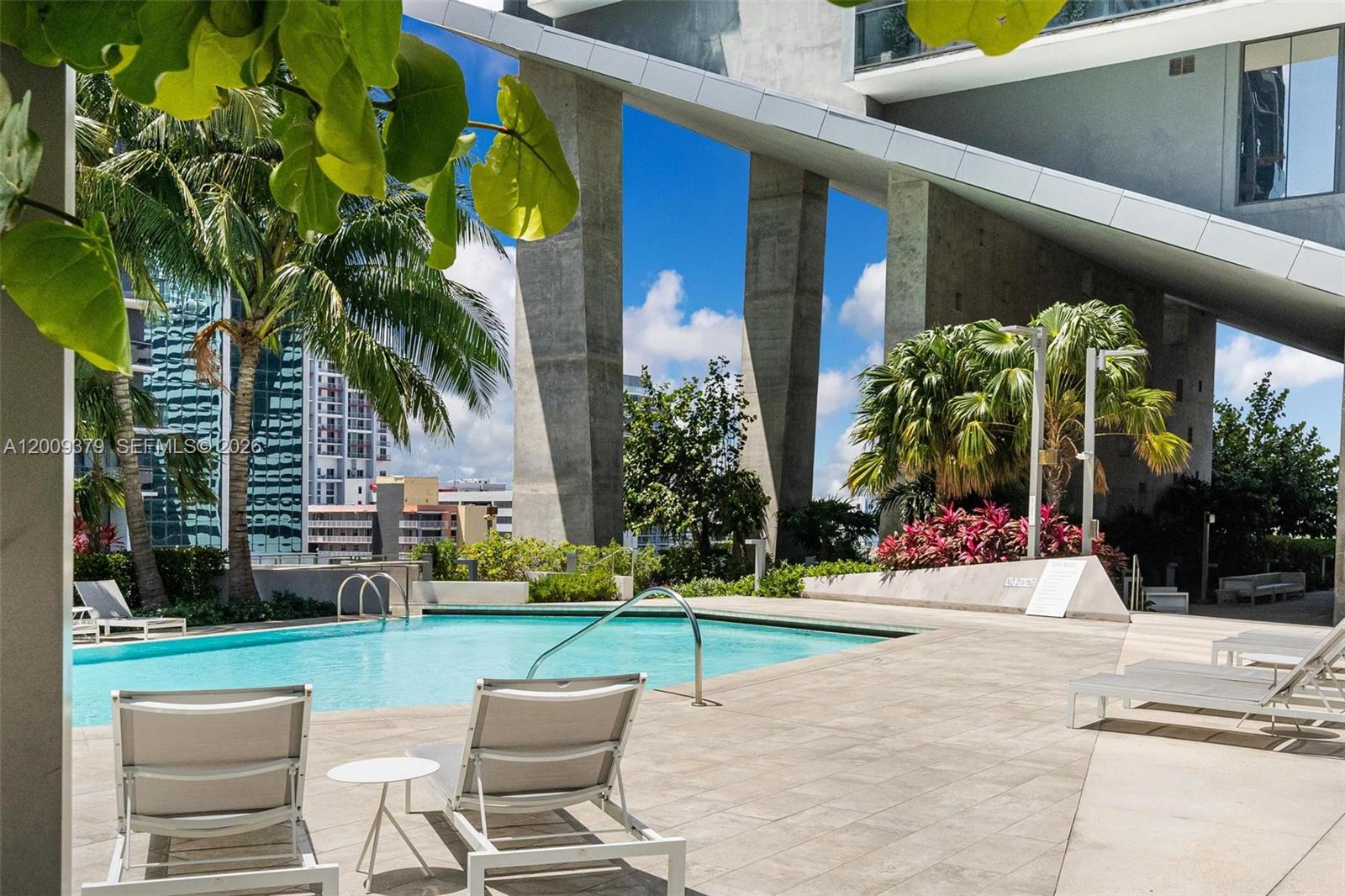88 Southwest 7th Street, Unit 3801 Miami, FL 33130 - Photo 87 of 87 a view of a backyard with a patio