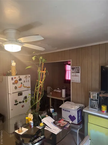 a room with furniture and gym equipment