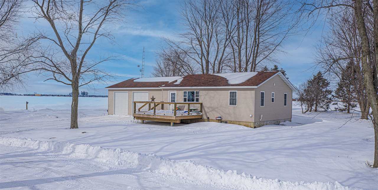 1785 Willow Road Franklin Grove, IL 61031 - Photo 1 of 38 a view of a house with a yard