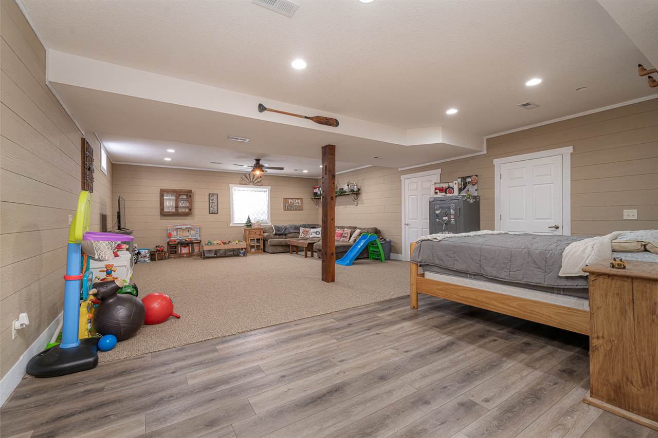 1785 Willow Road Franklin Grove, IL 61031 - Photo 23 of 38 a living room with furniture and a wooden floor