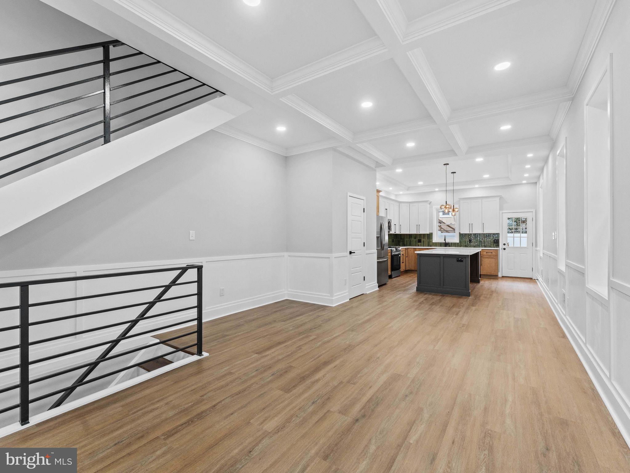 138 West Sharpnack Street Philadelphia, PA 19119 - Photo 12 of 44 a view of kitchen and kitchen with wooden floor