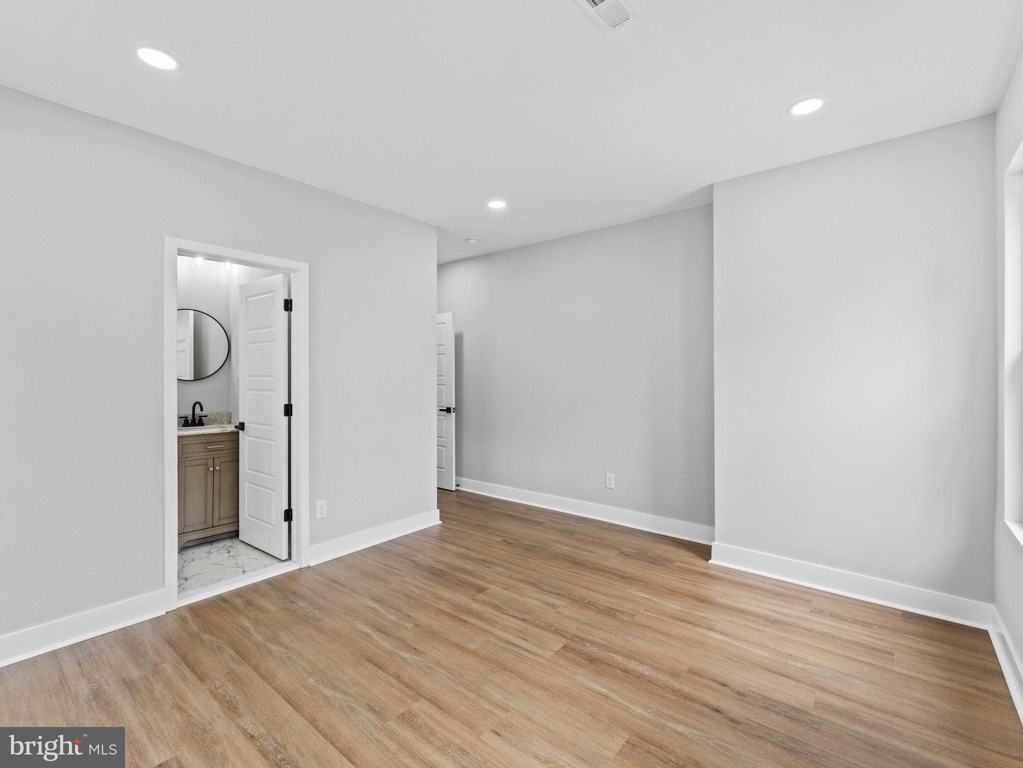 138 West Sharpnack Street Philadelphia, PA 19119 - Photo 27 of 44 wooden floor in an empty room with wooden floor