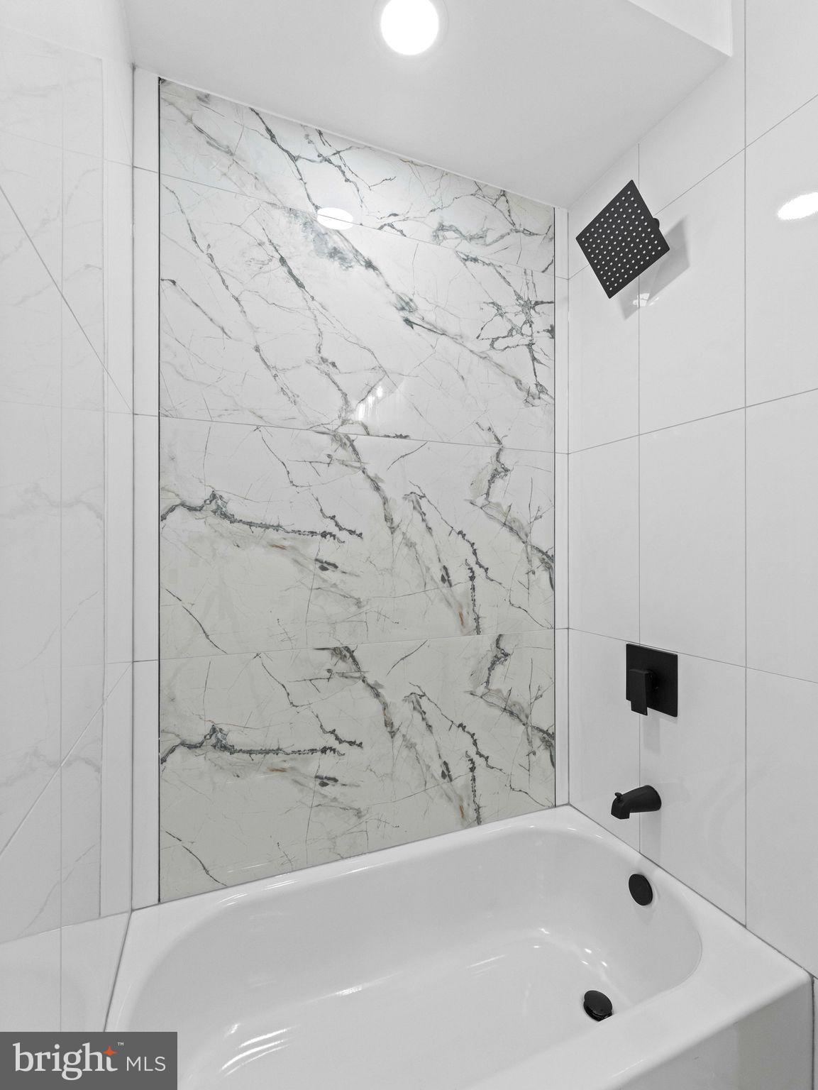 138 West Sharpnack Street Philadelphia, PA 19119 - Photo 29 of 44 a bathroom with a bathtub