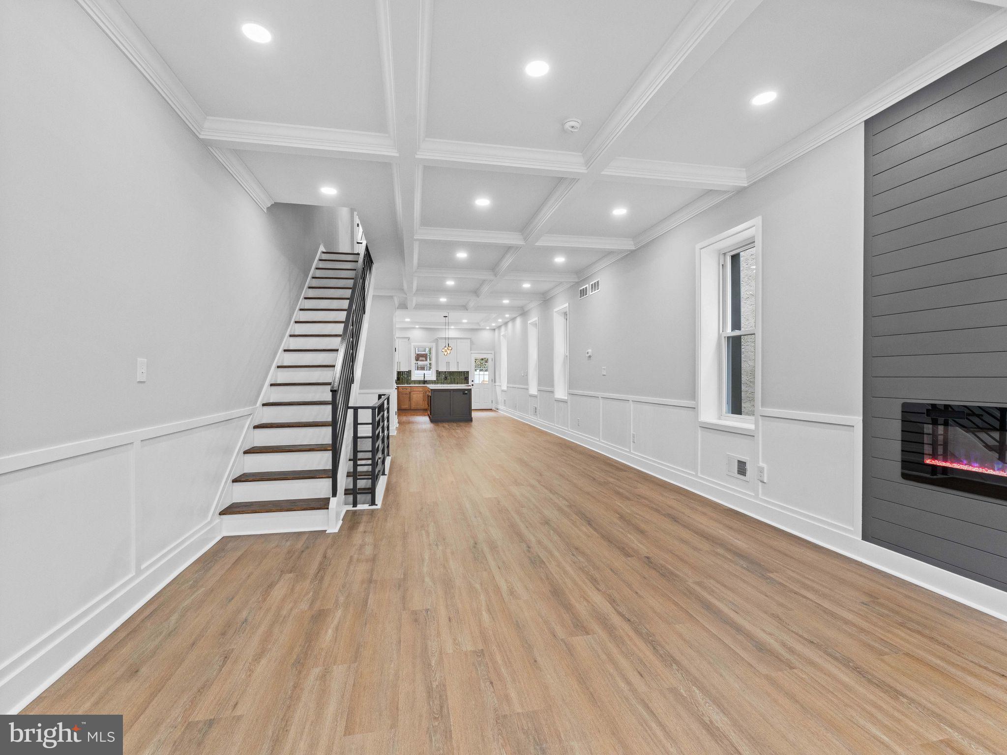 138 West Sharpnack Street Philadelphia, PA 19119 - Photo 5 of 44 a view of stairs with wooden floor