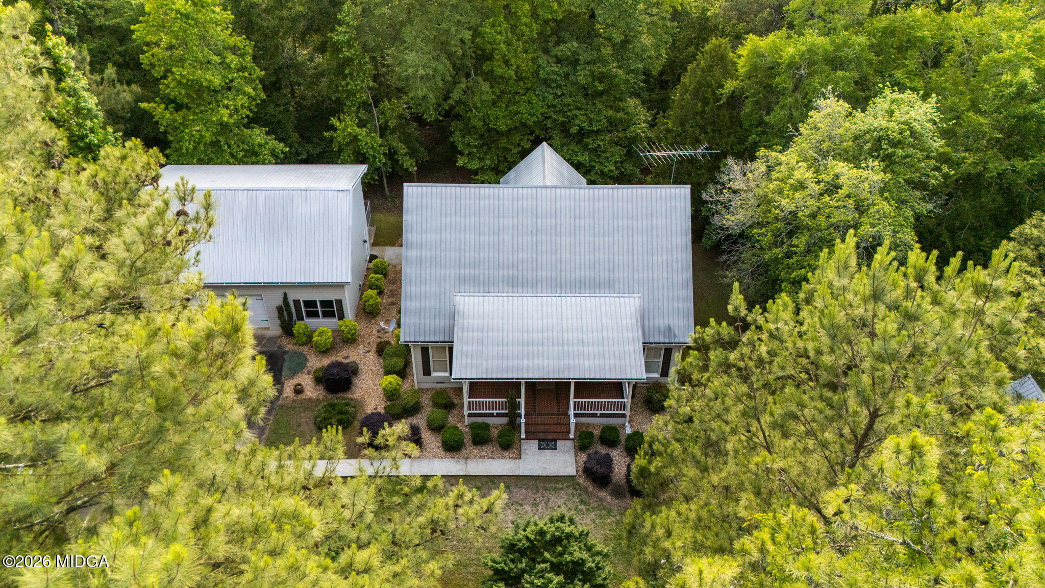 4686 Johnstonville Road Forsyth, GA 31029 - Photo 30 of 34 front view of house with a yard