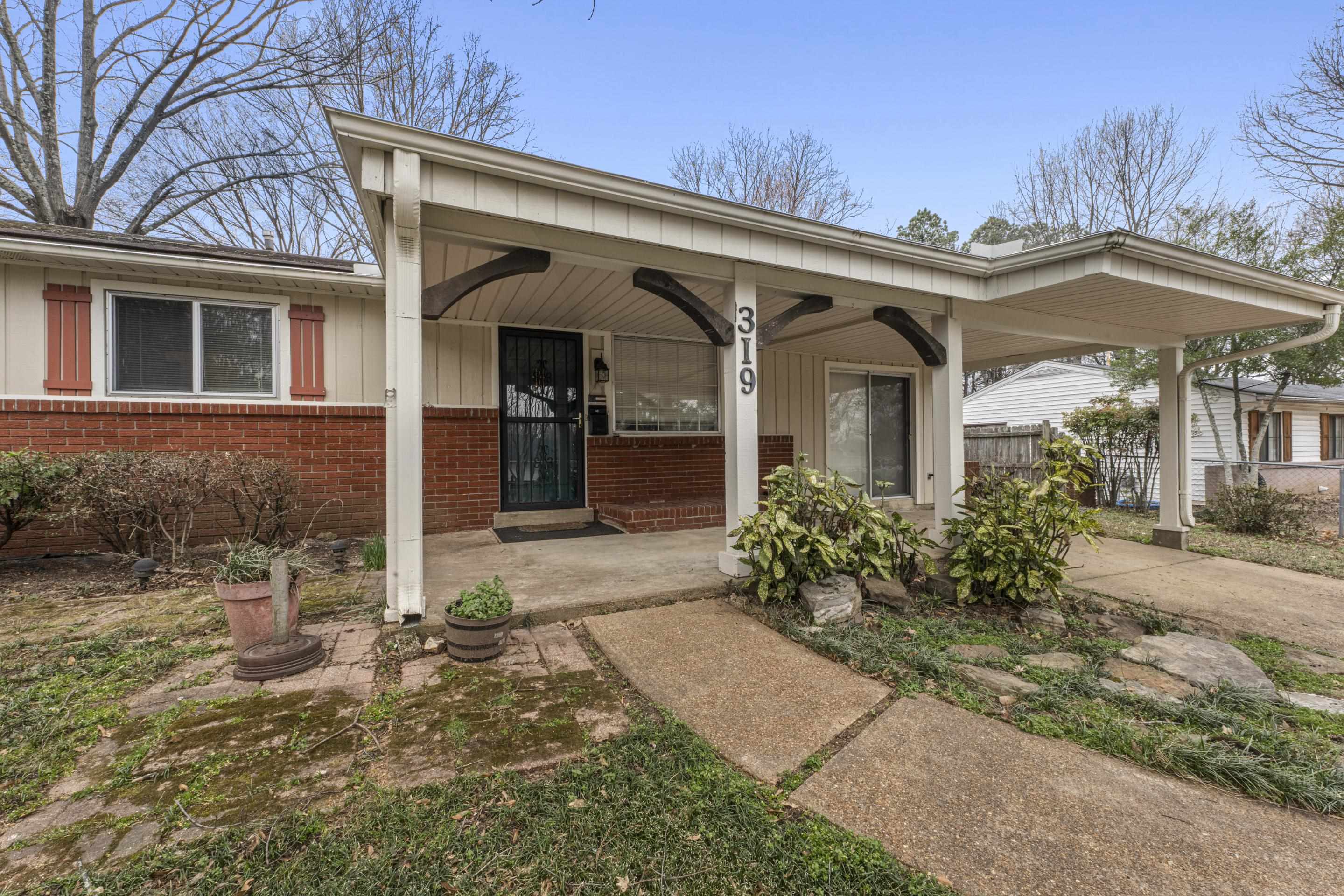 319 Homeville Road Collierville, TN 38017 - Photo 3 of 21 front view of a house with a small yard
