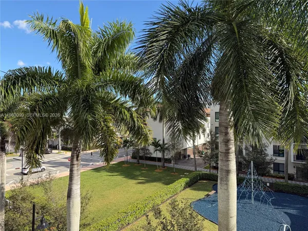 a view of a swimming pool with a garden