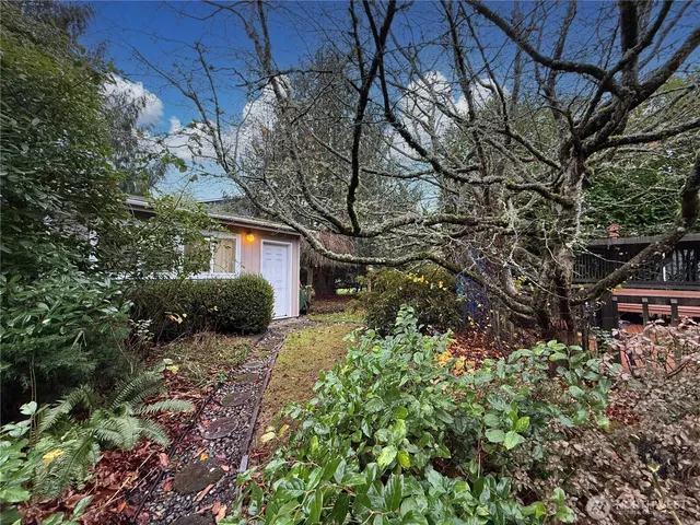 a view of a wooden deck with a bench